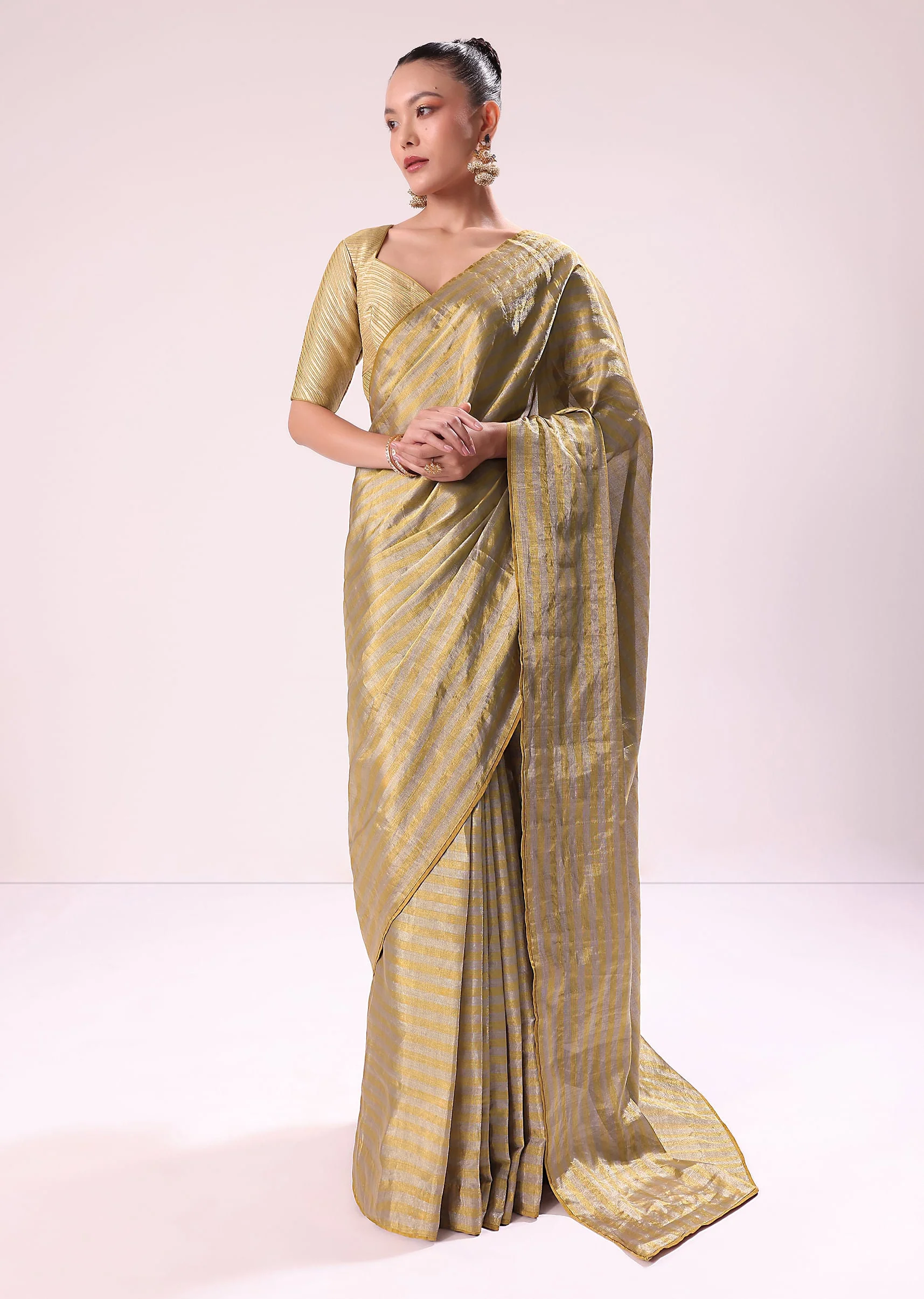 13595-gold-chanderi-tissue-saree-with-pipe-finish-stitched-blouse-1.webp Gold Chanderi Tissue Saree With Pipe Finish Stitched Blouse