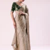 Silver Zari Tissue Saree With Embroidered Emerald Green Stitched Blouse