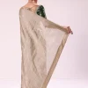 Silver Zari Tissue Saree With Embroidered Emerald Green Stitched Blouse
