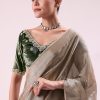 Silver Zari Tissue Saree With Embroidered Emerald Green Stitched Blouse