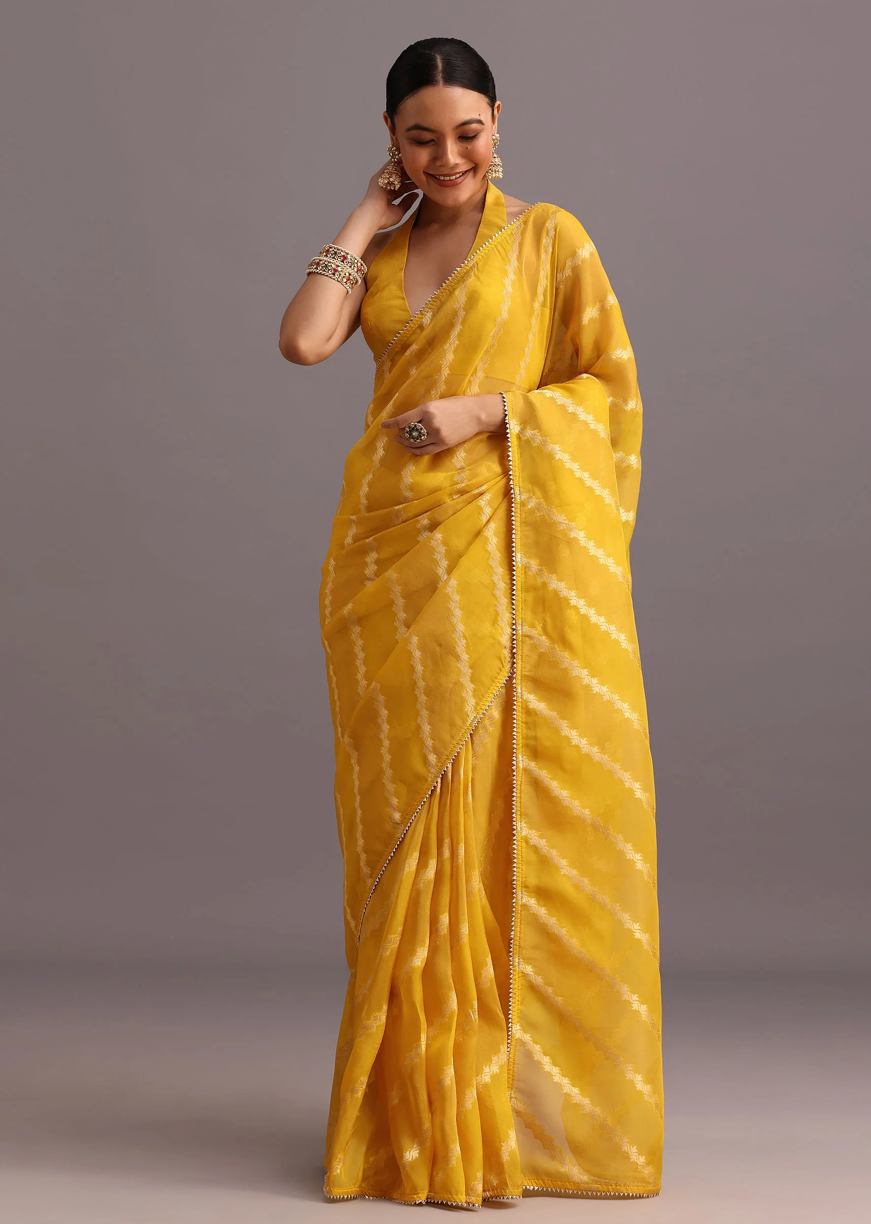 13943-yellow-dola-silk-leheriya-woven-saree-with-gotta-patti-border-1.webp Yellow Dola Silk Leheriya Woven Saree With Gotta Patti Border