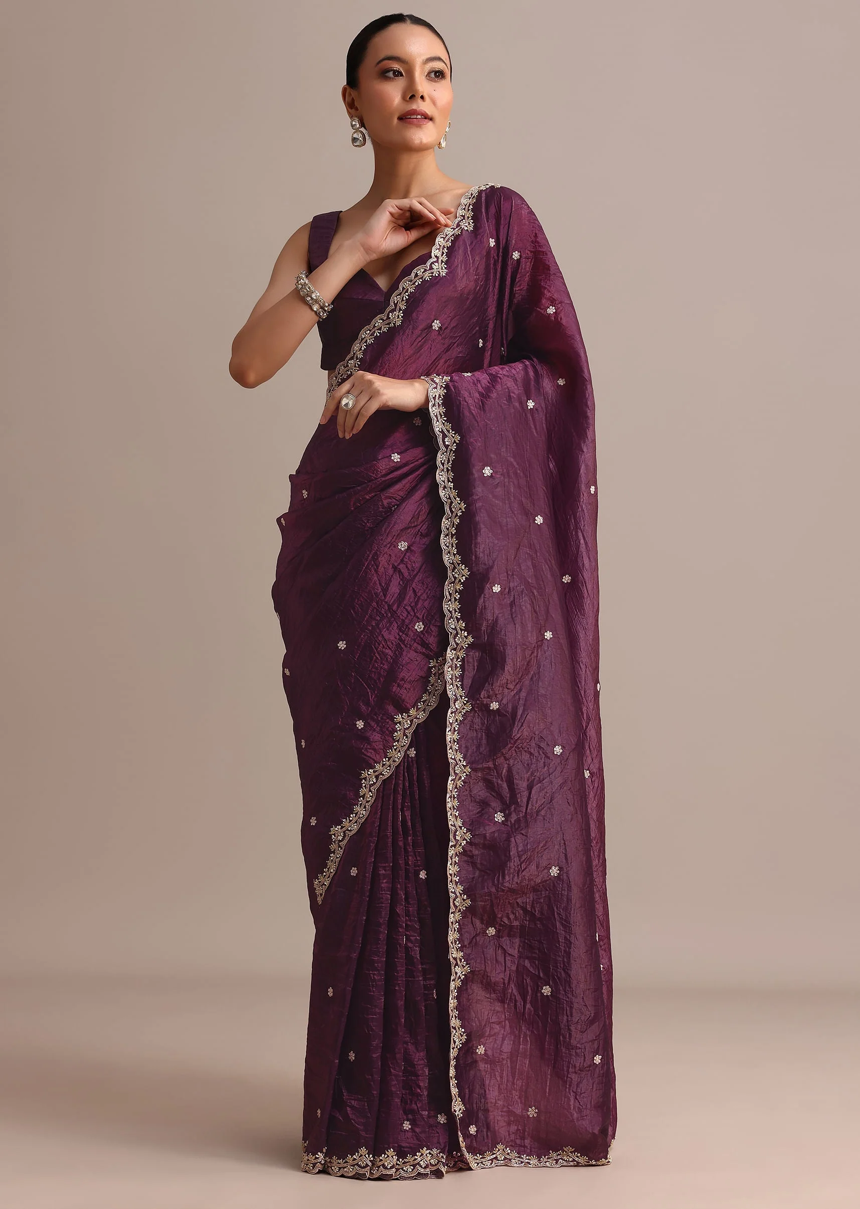 1413-purple-crushed-tissue-saree-with-sequin-and-cutdana-embroidered-border-1.webp Purple Crushed Tissue Saree With Sequin And Cutdana Embroidered Border