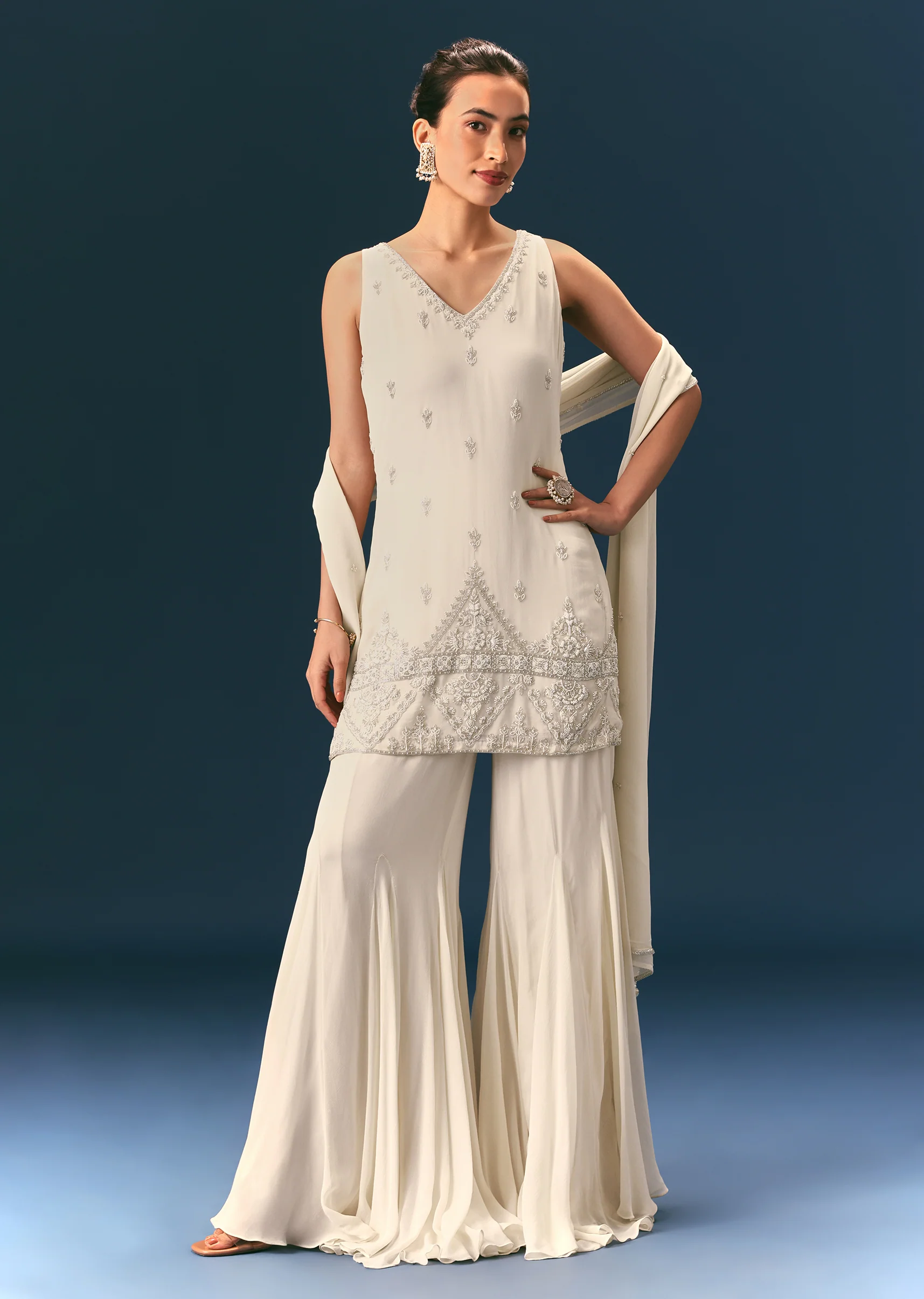 14198-off-white-hand-embroidered-sharara-suit-with-choker-dupatta-1.webp Off White Hand Embroidered Sharara Suit With Choker Dupatta