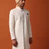 Blush Pink Sherwani Adorned with Intricate Embroidery All Over