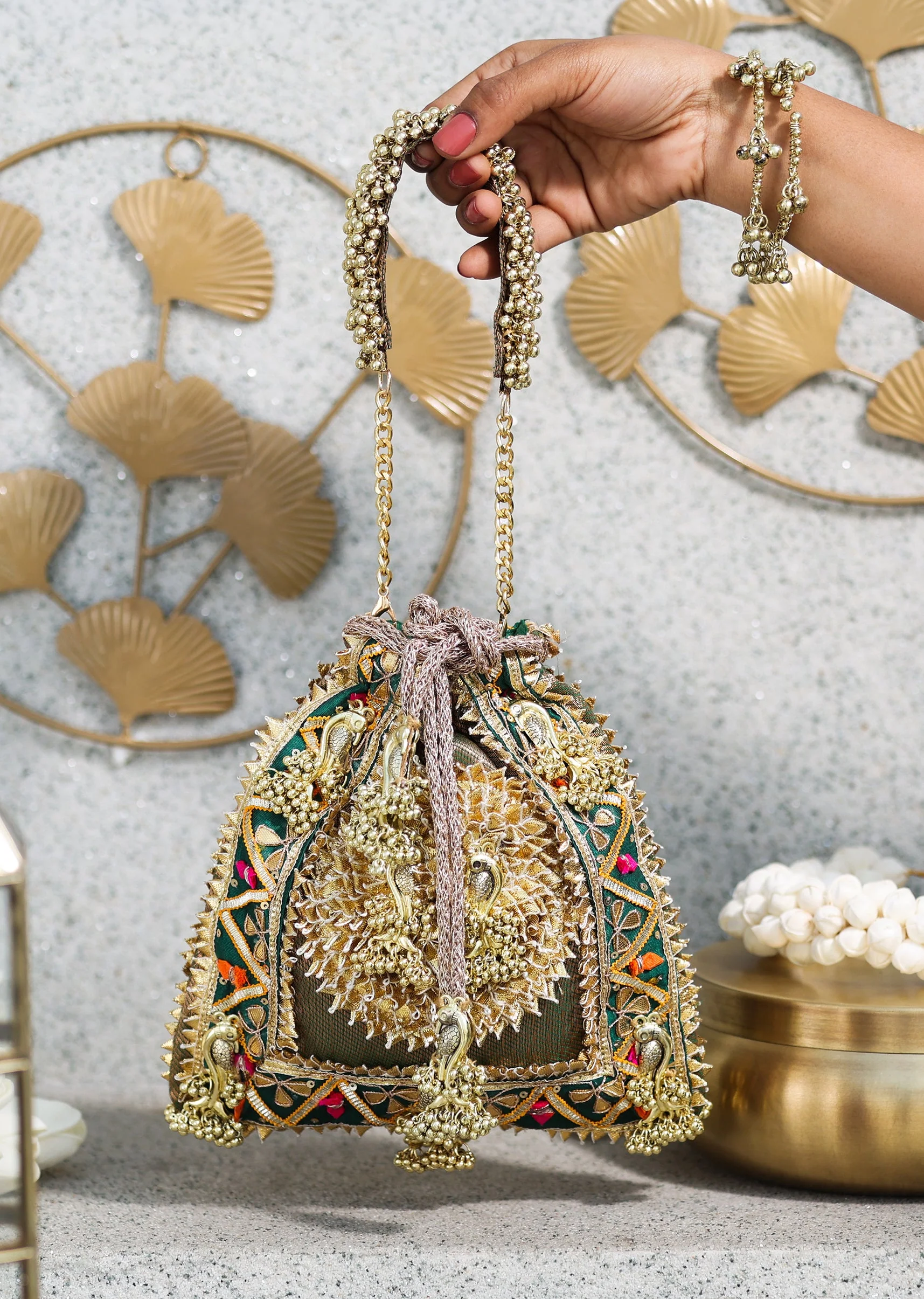 146-gold-brocade-potli-bag-1.webp Gold Brocade Potli Bag
