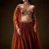 Rust Color Rushing Lehenga With Hand Embroidered Belt Blouse And Dupatta