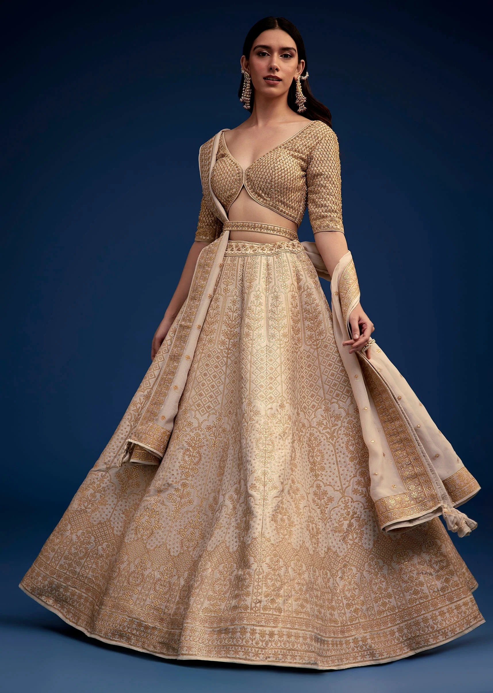 14851-beige-brocade-lehenga-set-and-belt-1.webp Beige Brocade Lehenga Set And Belt