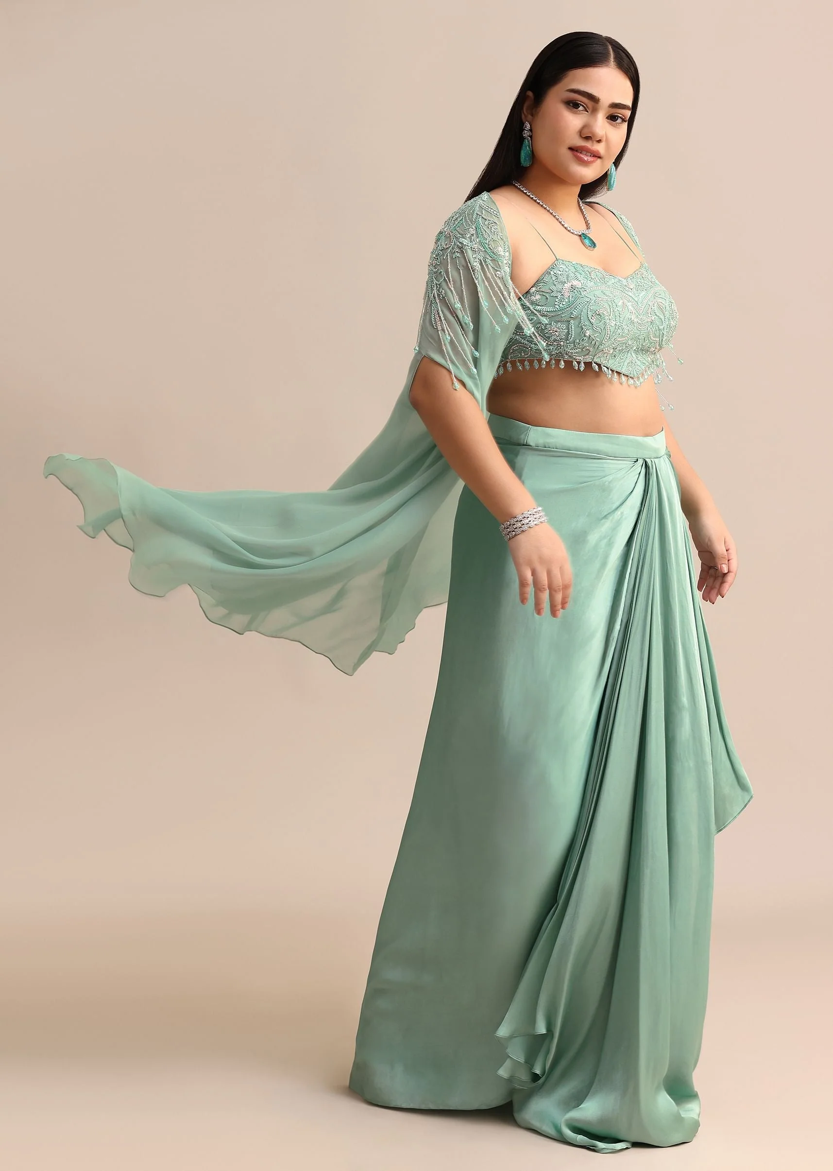 14952-blue-pleated-drape-skirt-and-embellished-cape-with-tassels-1.webp Blue Pleated Drape Skirt And Embellished Cape With Tassels