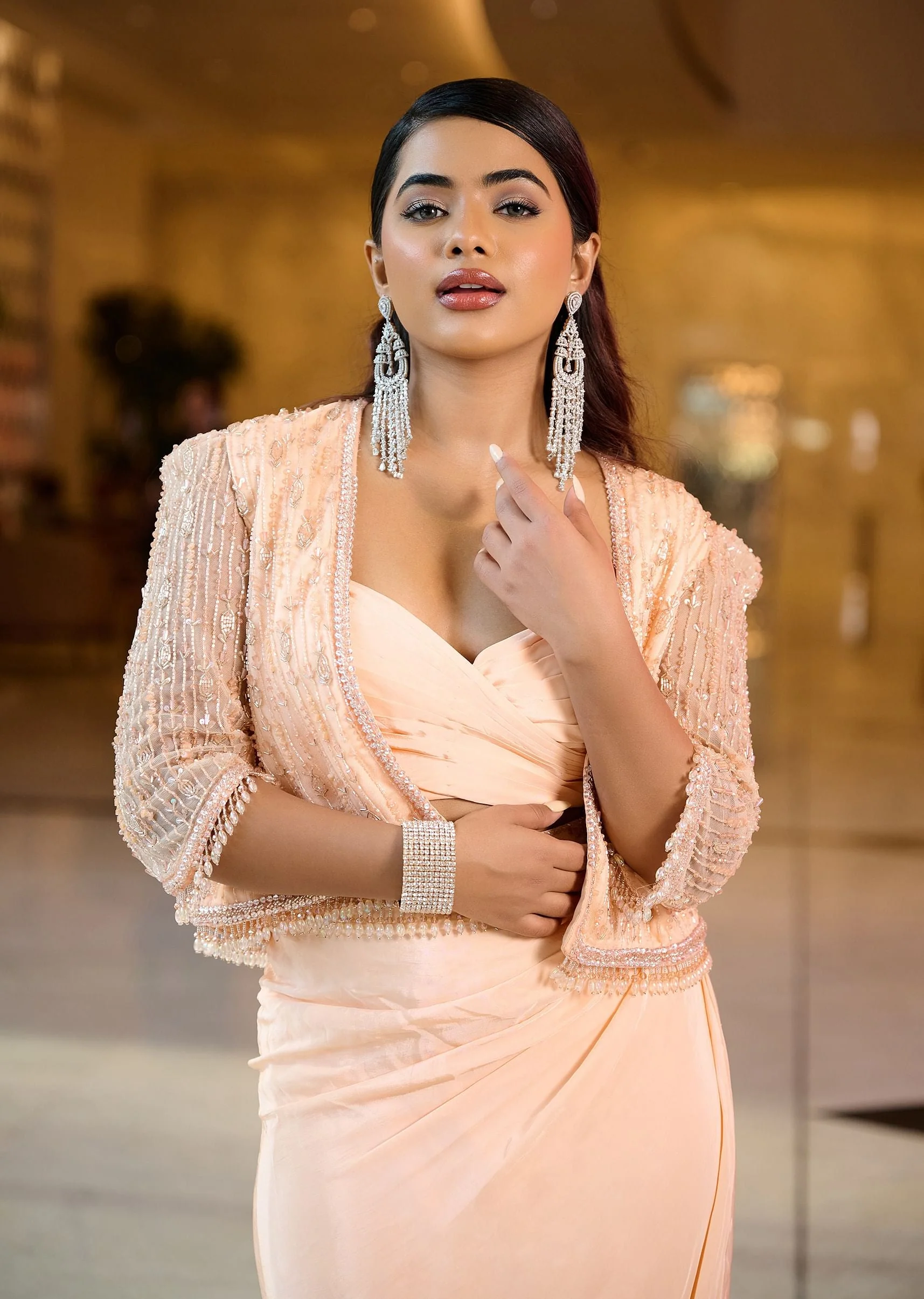 14982-light-peach-pleated-blouse-with-short-jacket-and-draped-frill-skirt-1.webp Light Peach Pleated Blouse With Short Jacket And Draped Frill Skirt
