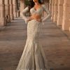 Beige Fish-Cut Lehenga And Blouse With Crystal Tassels