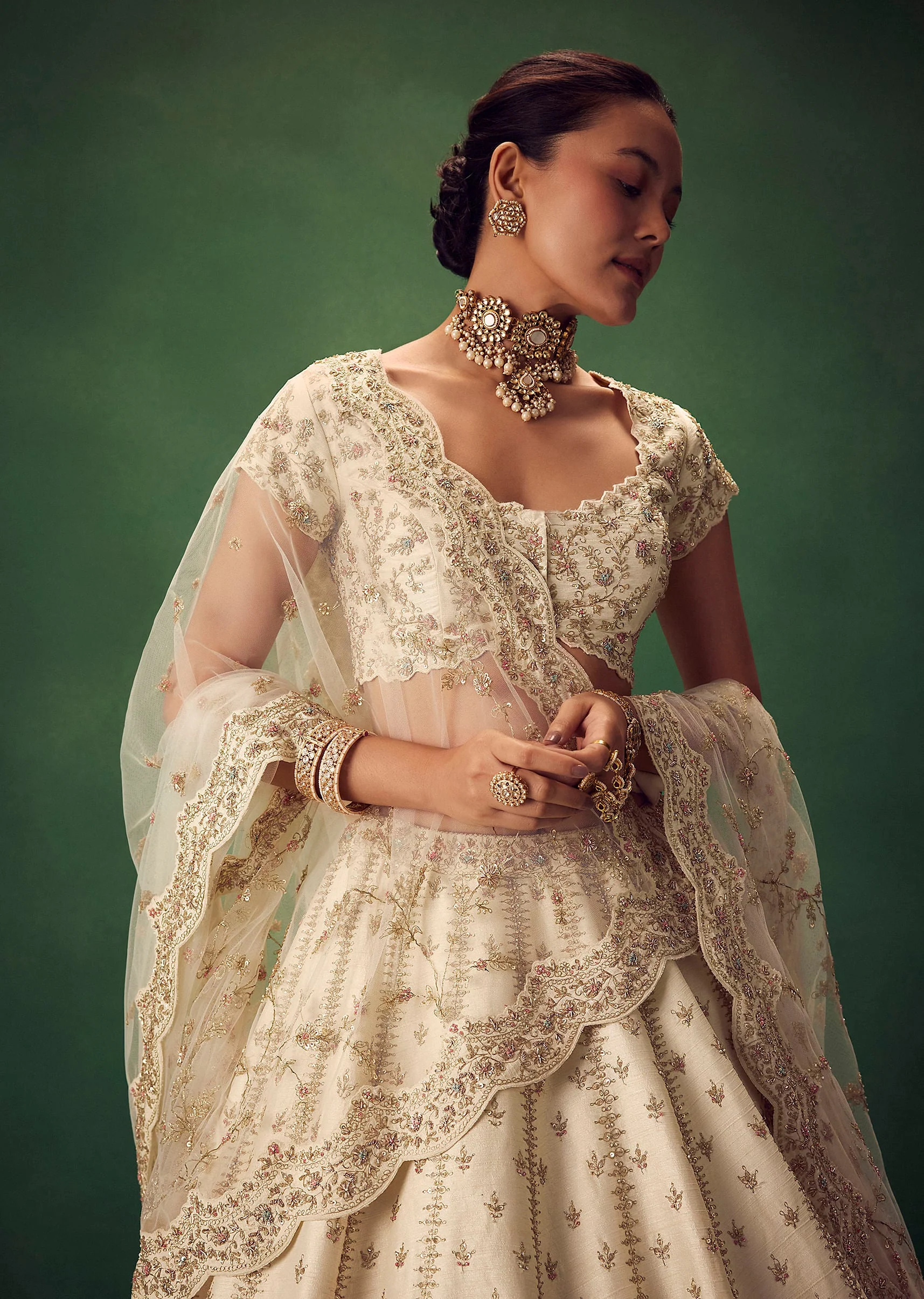 Ivory Lehenga Set With Hand Embroidered Thread And Zari Work