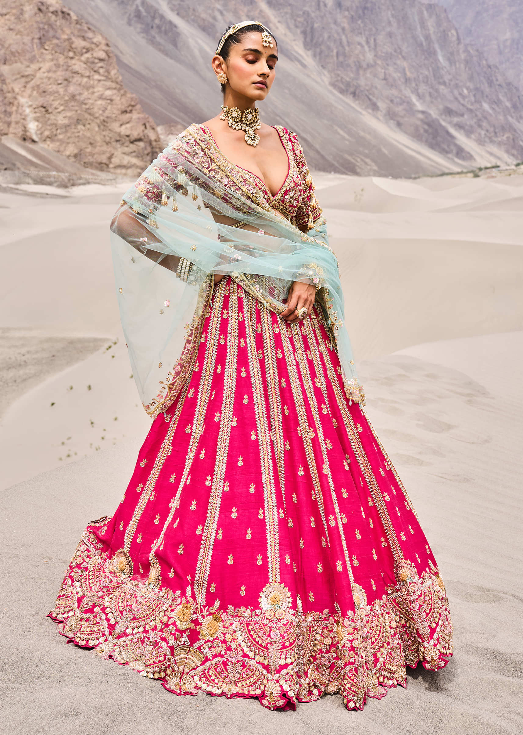 15332-rani-pink-heavy-embroidered-bridal-lehenga-with-two-dupattas-1.jpg Rani Pink Heavy Embroidered Bridal Lehenga With Two Dupattas