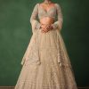 Gold Hand Embroidered Lehenga Set In Raw Silk With Dupatta