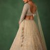 Gold Hand Embroidered Lehenga Set In Raw Silk With Dupatta