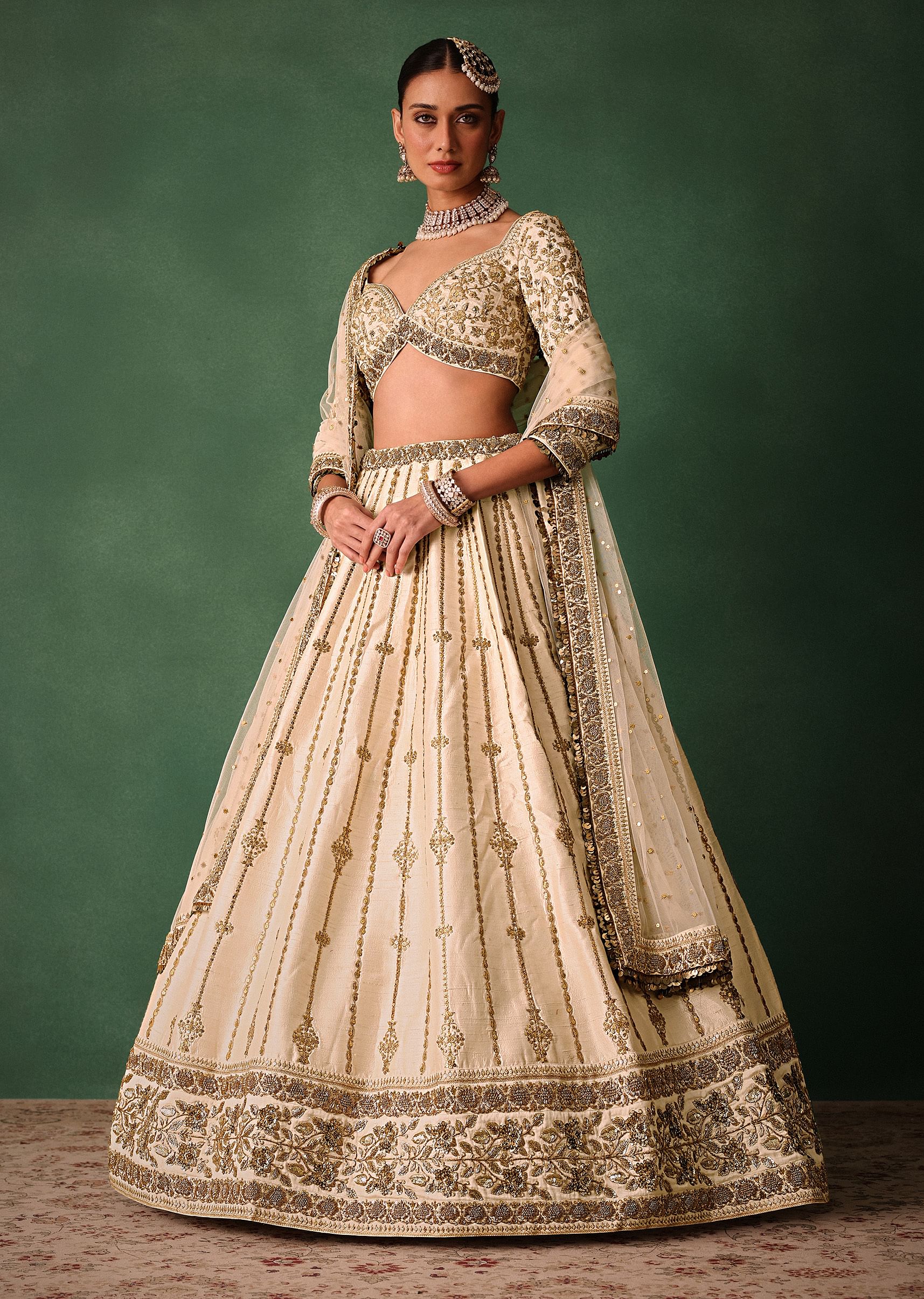 15674-ivory-raw-silk-hand-embroidered-lehenga-set-with-net-dupatta-1.jpg Ivory Raw Silk Hand Embroidered Lehenga Set With Net Dupatta