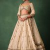 15674-ivory-raw-silk-hand-embroidered-lehenga-set-with-net-dupatta-3.jpg Ivory Raw Silk Hand Embroidered Lehenga Set With Net Dupatta