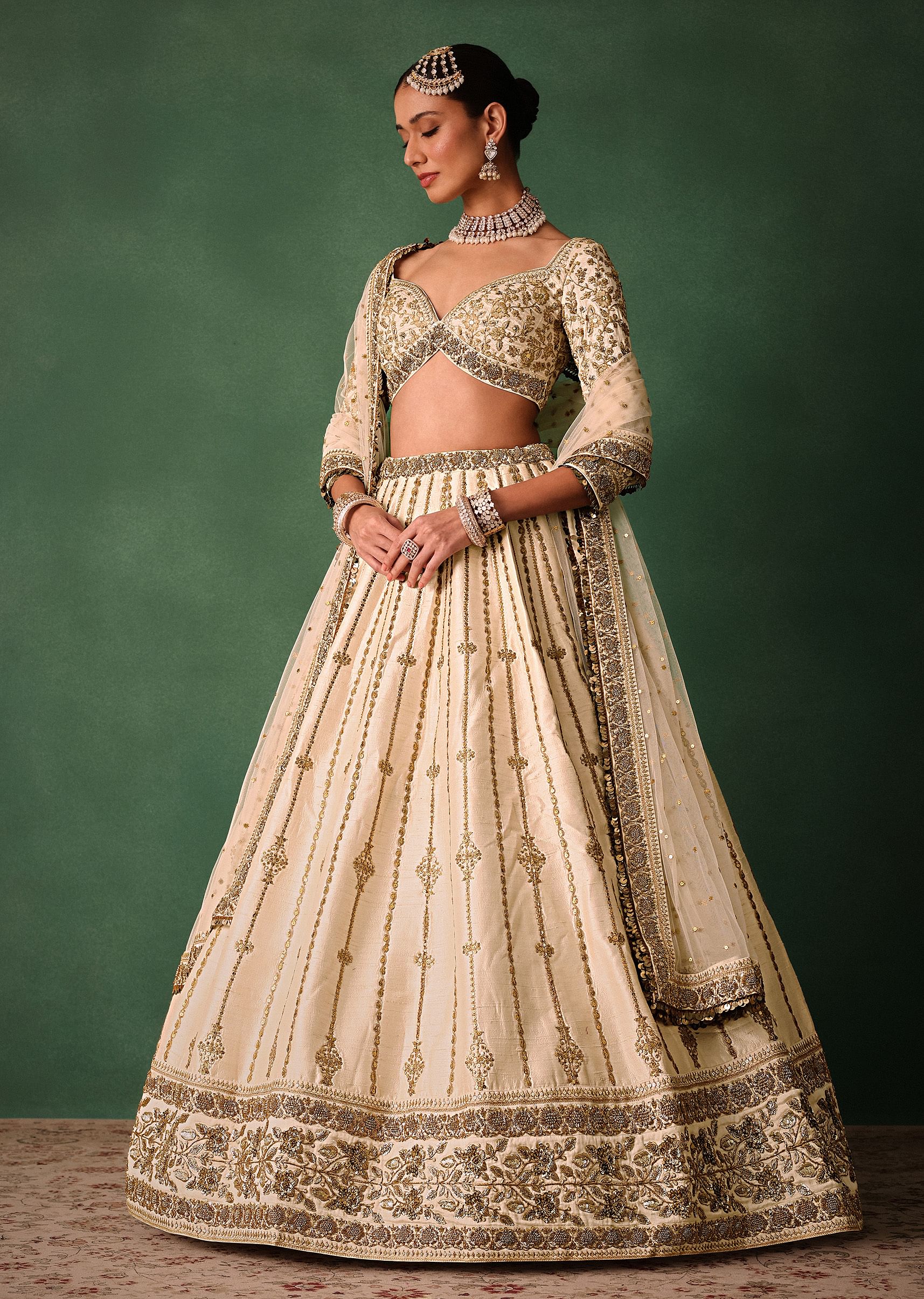 15674-ivory-raw-silk-hand-embroidered-lehenga-set-with-net-dupatta-3.jpg Ivory Raw Silk Hand Embroidered Lehenga Set With Net Dupatta