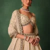 15674-ivory-raw-silk-hand-embroidered-lehenga-set-with-net-dupatta-4.webp Ivory Raw Silk Hand Embroidered Lehenga Set With Net Dupatta
