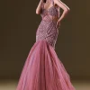 Mauve Mermaid Fit Gown With Tassel Detailing And Gathering At Bottom