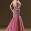 Mauve Mermaid Fit Gown With Tassel Detailing And Gathering At Bottom