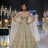 Beige Bridal Lehenga Set In Raw Silk With Jaal Embroidery And Pearl Tassels