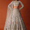 Gold Hand Embroidered Bridal Lehenga Set In Organza