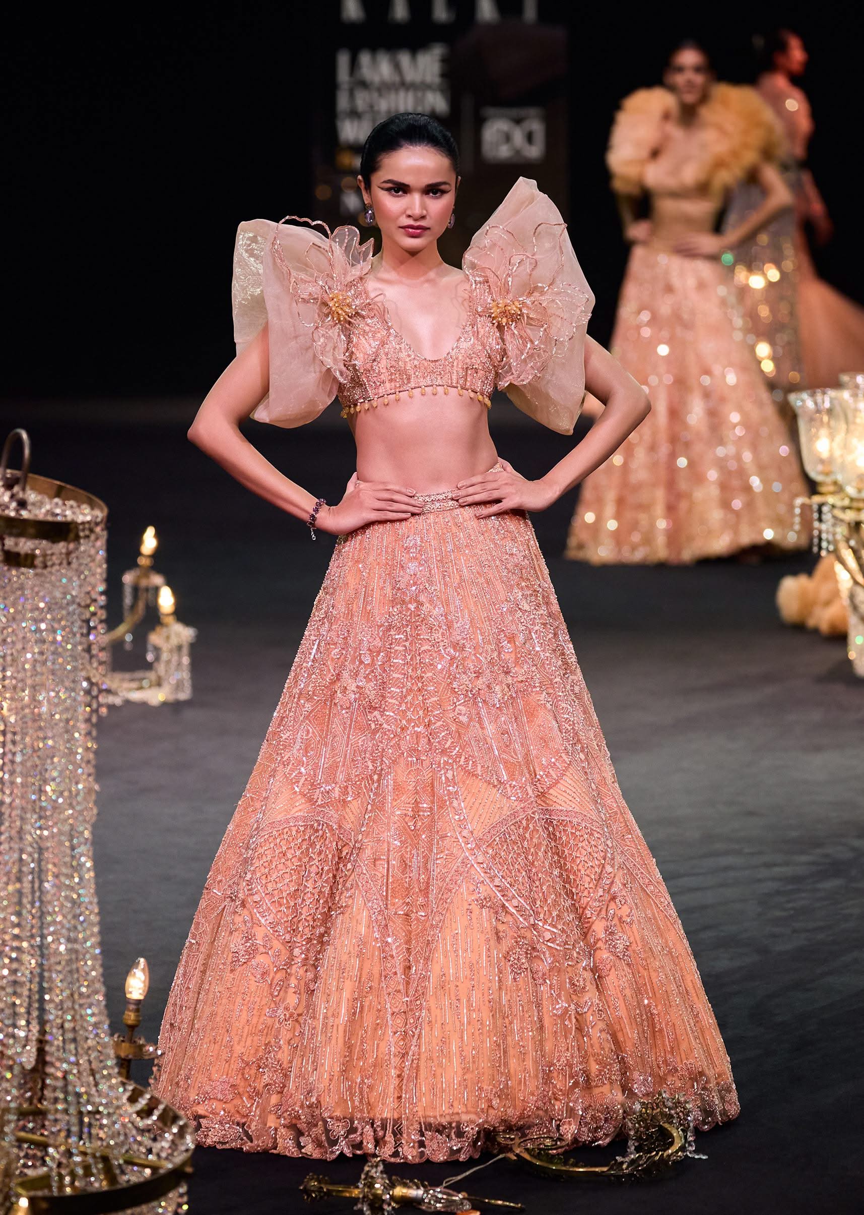 16215-peach-zardosi-lehenga-with-dramatic-net-sleeves-blouse-1.jpg Peach Zardosi Lehenga With Dramatic Net Sleeves Blouse