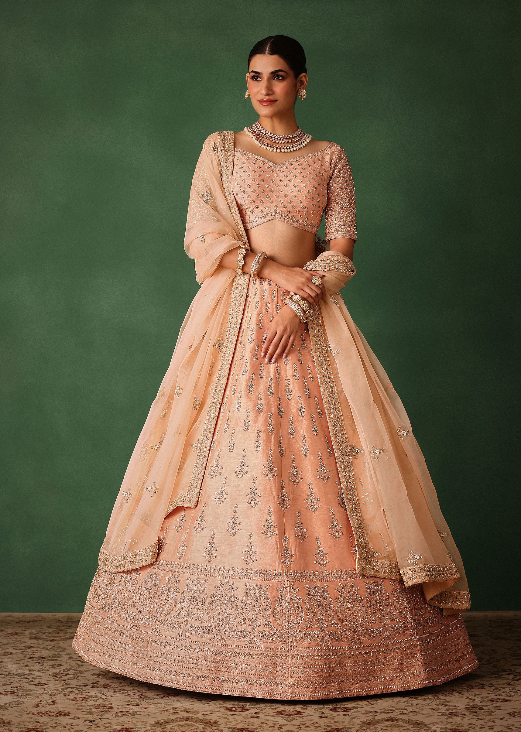 16266-peach-hand-embroidered-raw-silk-lehenga-set-with-butti-work-1.jpg Peach Hand Embroidered Raw Silk Lehenga Set With Butti Work