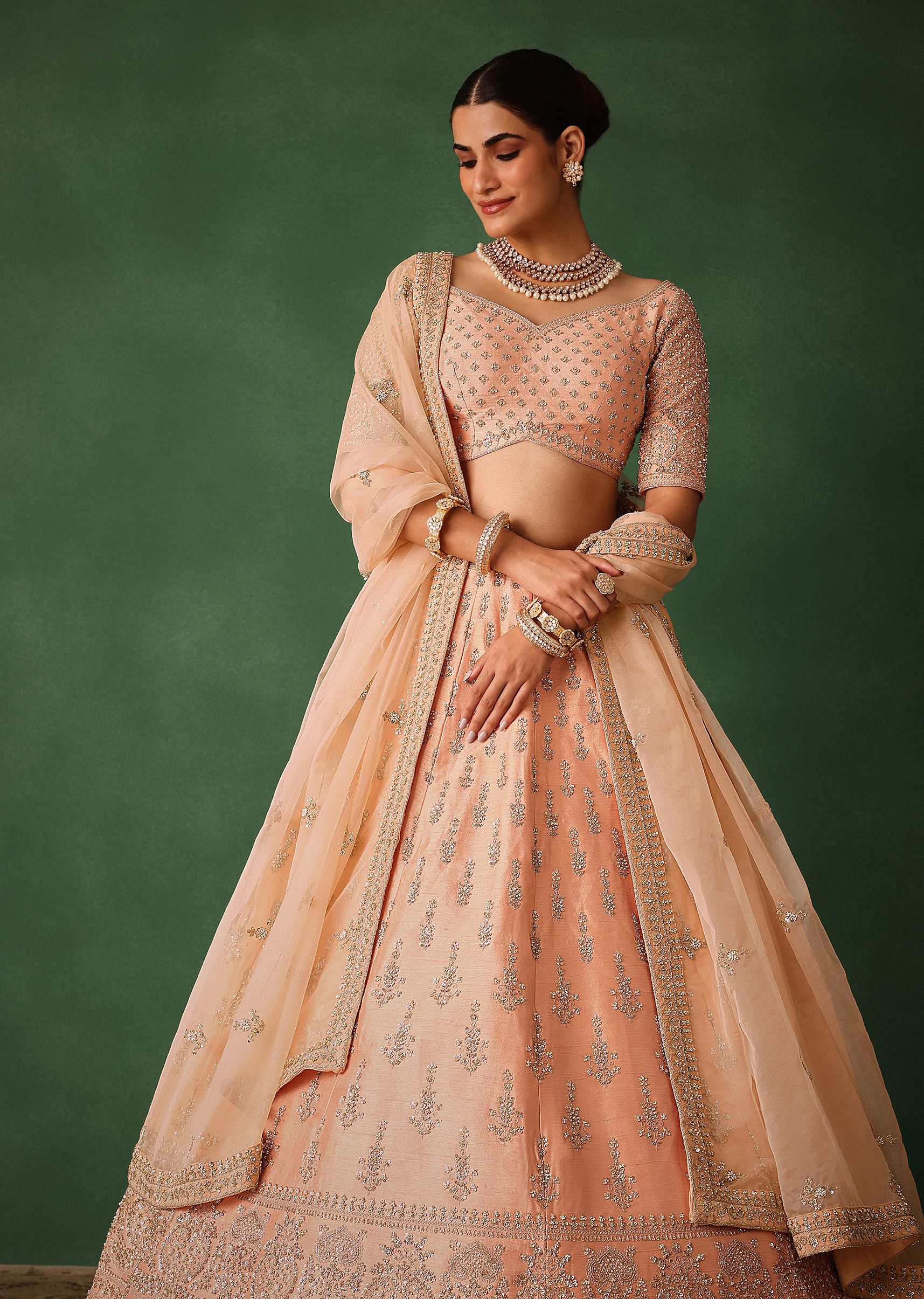 16266-peach-hand-embroidered-raw-silk-lehenga-set-with-butti-work-2.jpg Peach Hand Embroidered Raw Silk Lehenga Set With Butti Work