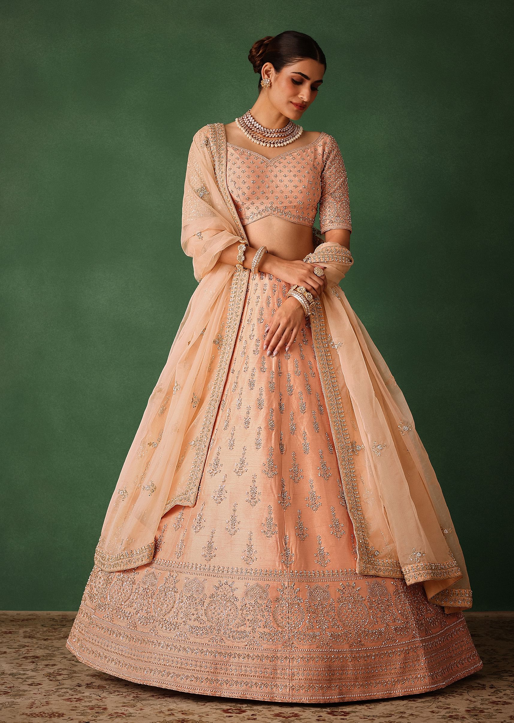 16266-peach-hand-embroidered-raw-silk-lehenga-set-with-butti-work-3.jpg Peach Hand Embroidered Raw Silk Lehenga Set With Butti Work