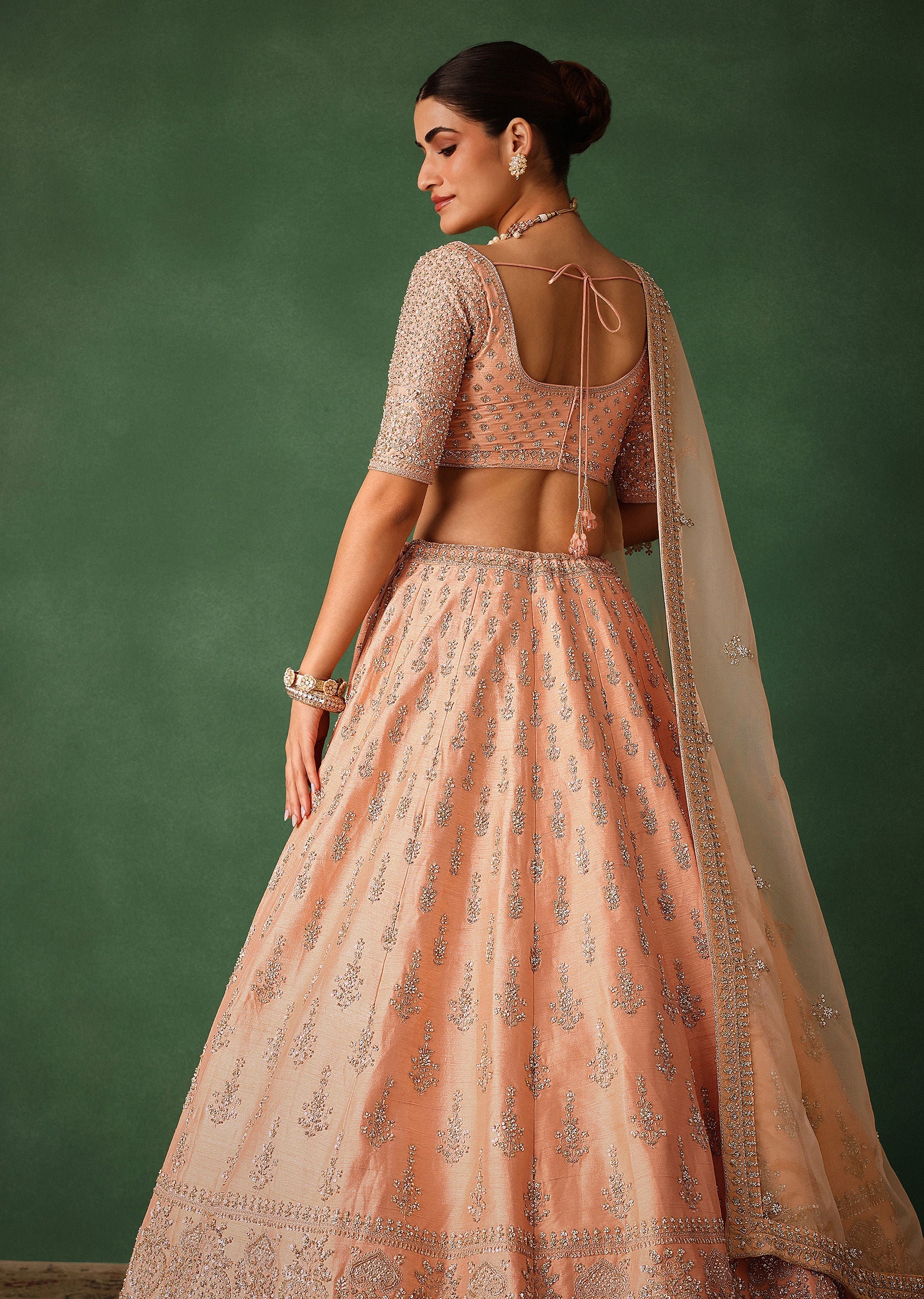 16266-peach-hand-embroidered-raw-silk-lehenga-set-with-butti-work-4.jpg Peach Hand Embroidered Raw Silk Lehenga Set With Butti Work