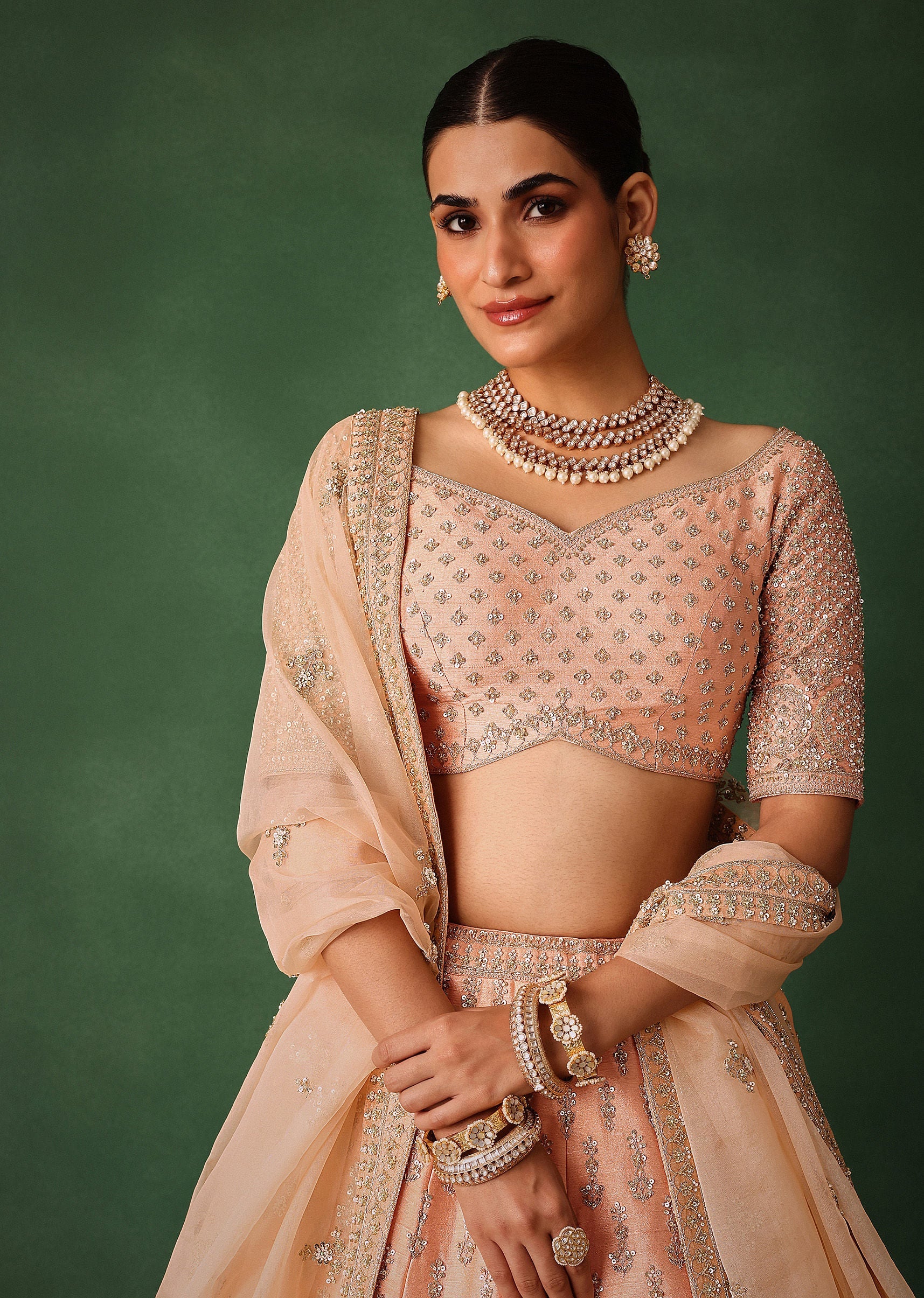 16266-peach-hand-embroidered-raw-silk-lehenga-set-with-butti-work-5.jpg Peach Hand Embroidered Raw Silk Lehenga Set With Butti Work