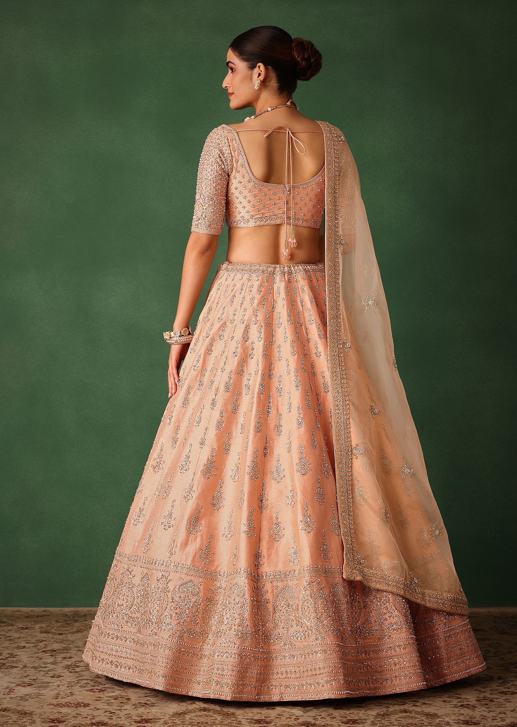 16266-peach-hand-embroidered-raw-silk-lehenga-set-with-butti-work-6.jpg Peach Hand Embroidered Raw Silk Lehenga Set With Butti Work