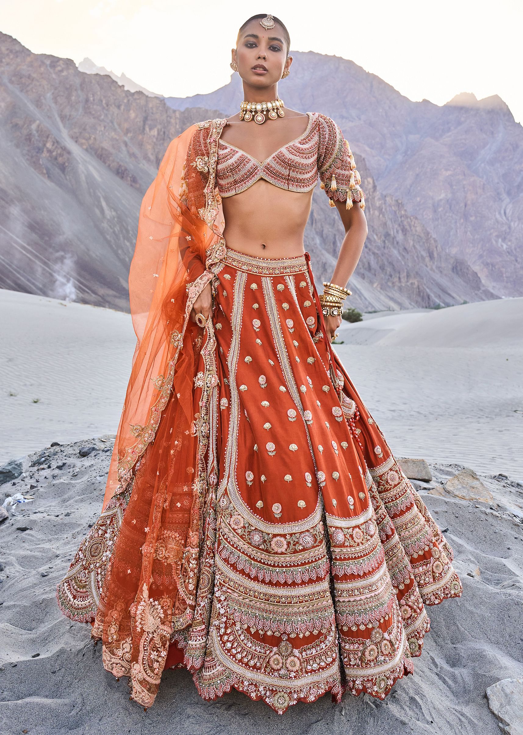 16280-rust-lehenga-with-moti-embroidered-two-dupattas-1.jpg Rust Lehenga With Moti Embroidered Two Dupattas