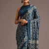 Teal Satin Ajrakh Print Saree With Mirror Embellished Border And Pallu