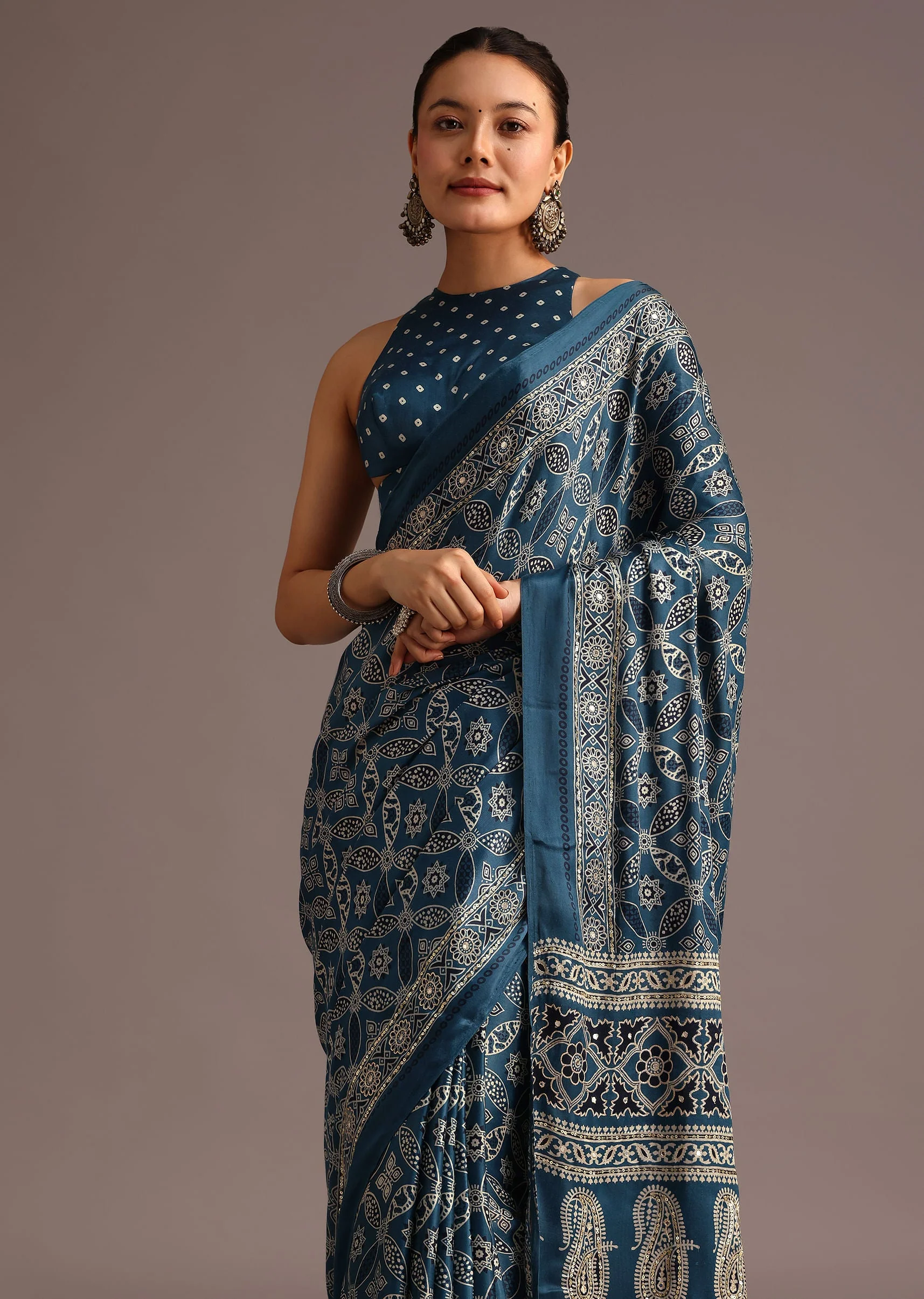 Teal Satin Ajrakh Print Saree With Mirror Embellished Border And Pallu