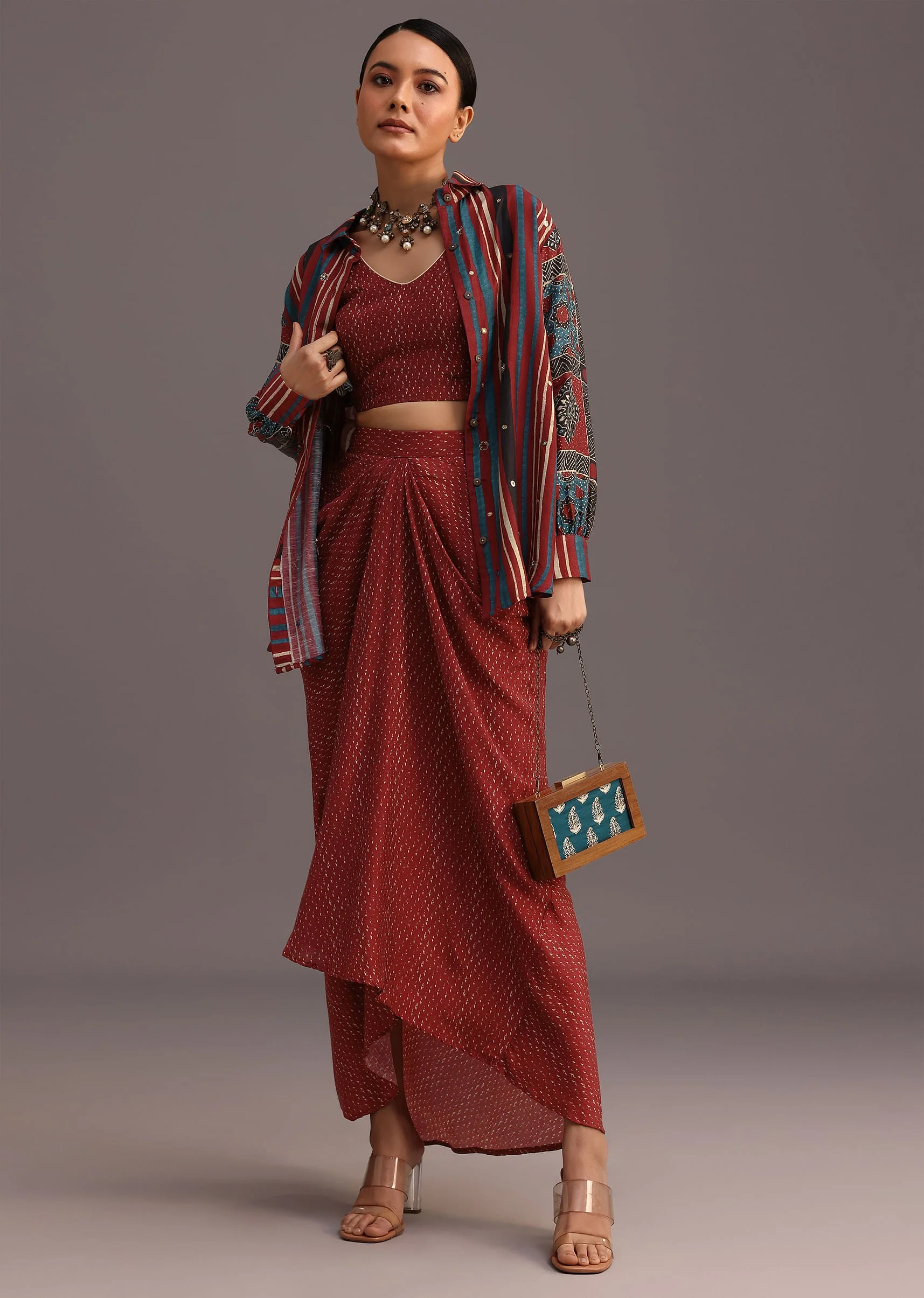 17037-red-ajrakh-printed-shirt-and-croptop-with-draped-skirt-1.webp Red Ajrakh Printed Shirt And Croptop With Draped Skirt