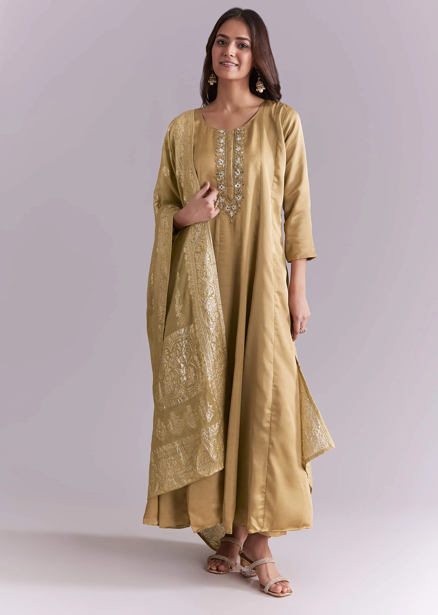 17204-gold-muslin-anarkali-suit-with-mirror-and-moti-embroidery-1.webp Gold Muslin Anarkali Suit With Mirror And Moti Embroidery