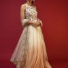 Off White Anarkali Suit With Halter Neckline And Adorned In Multicolored Hand Embroidered Floral Design On The Bodice