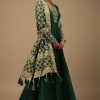 Bottle Green Anarkali Suit In Raw Silk With Hand Embroidery And A Brocade Dupatta Enhanced With Bandhani