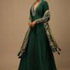 Bottle Green Anarkali Suit In Raw Silk With Hand Embroidery And A Brocade Dupatta Enhanced With Bandhani