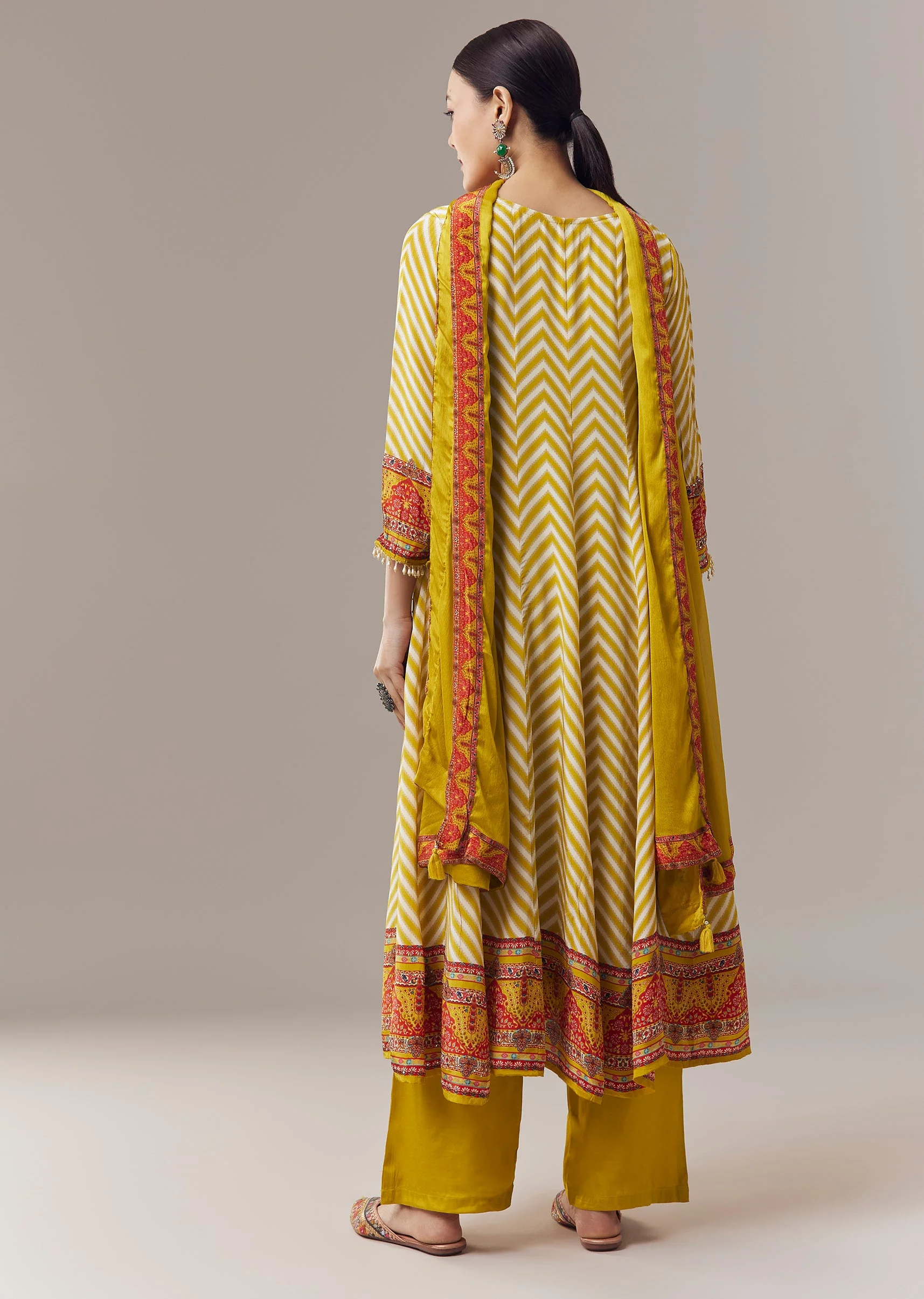 Yellow Anarkali Suit In Chevron Print With Mirror Moti And Stone Work And Dupatta