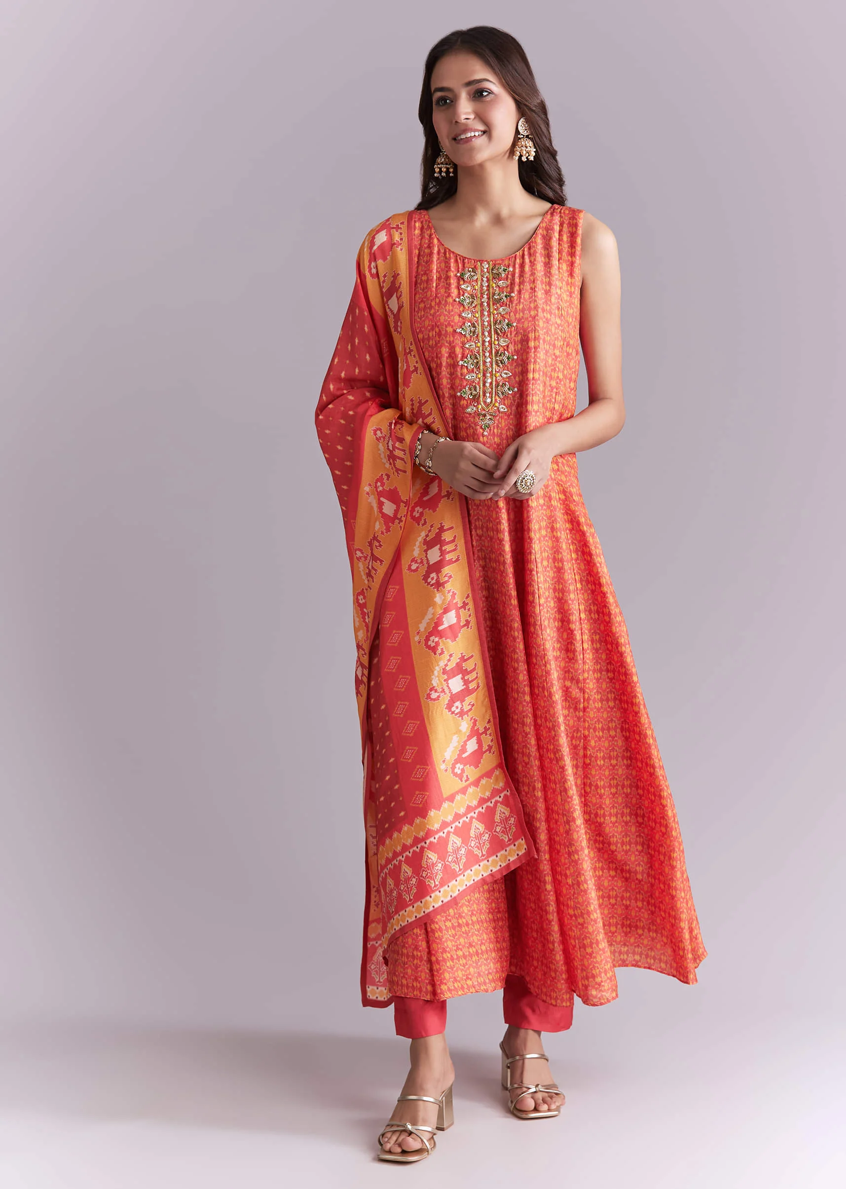 19823-dir-5dbc98dcc983-s-variation-1.webp Orange Muslin Anarkali Suit With Indie Print