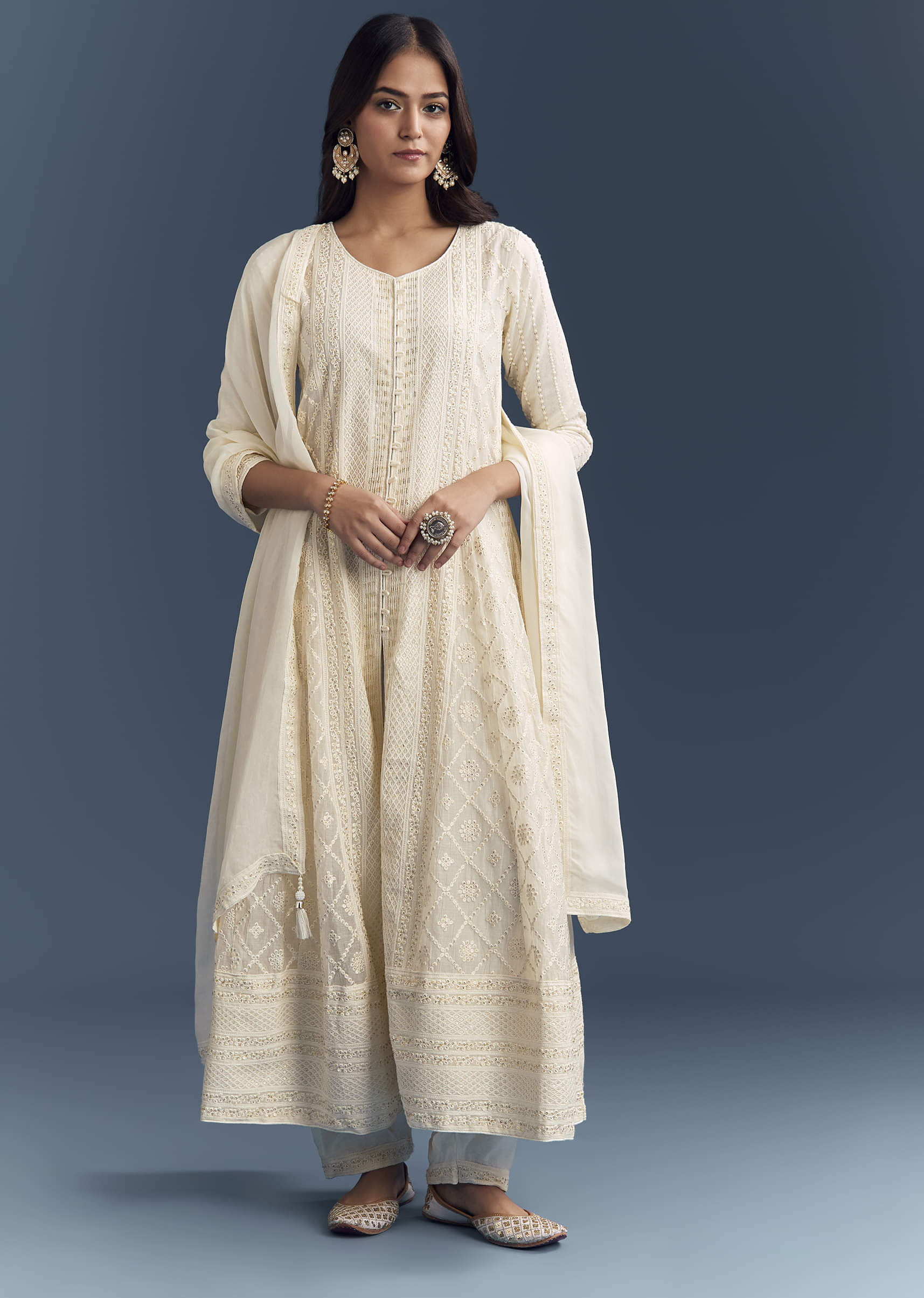 20030-ivory-chanderi-anarkali-suit-with-thread-and-sequins-embroidery-1.jpg Ivory Chanderi Anarkali Suit With Thread And Sequins Embroidery