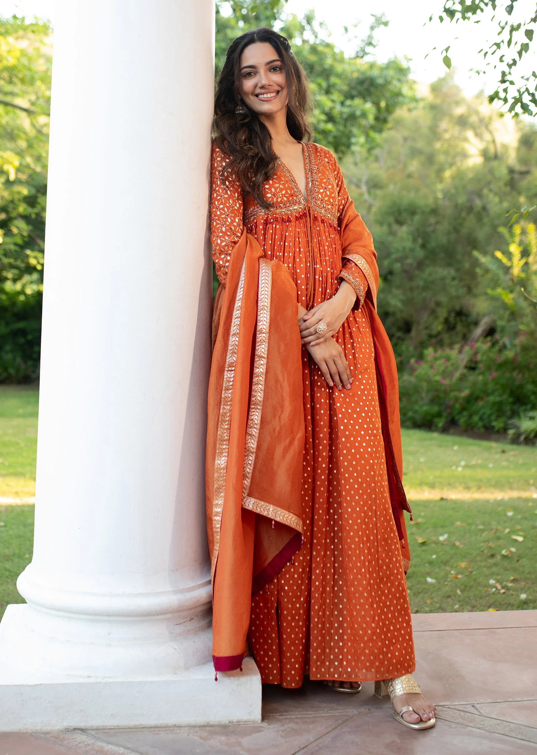 20742-warm-rust-orange-brocade-cutdana-beaded-anarkali-suit-1.webp Warm Rust Orange Brocade Cutdana Beaded Anarkali Suit