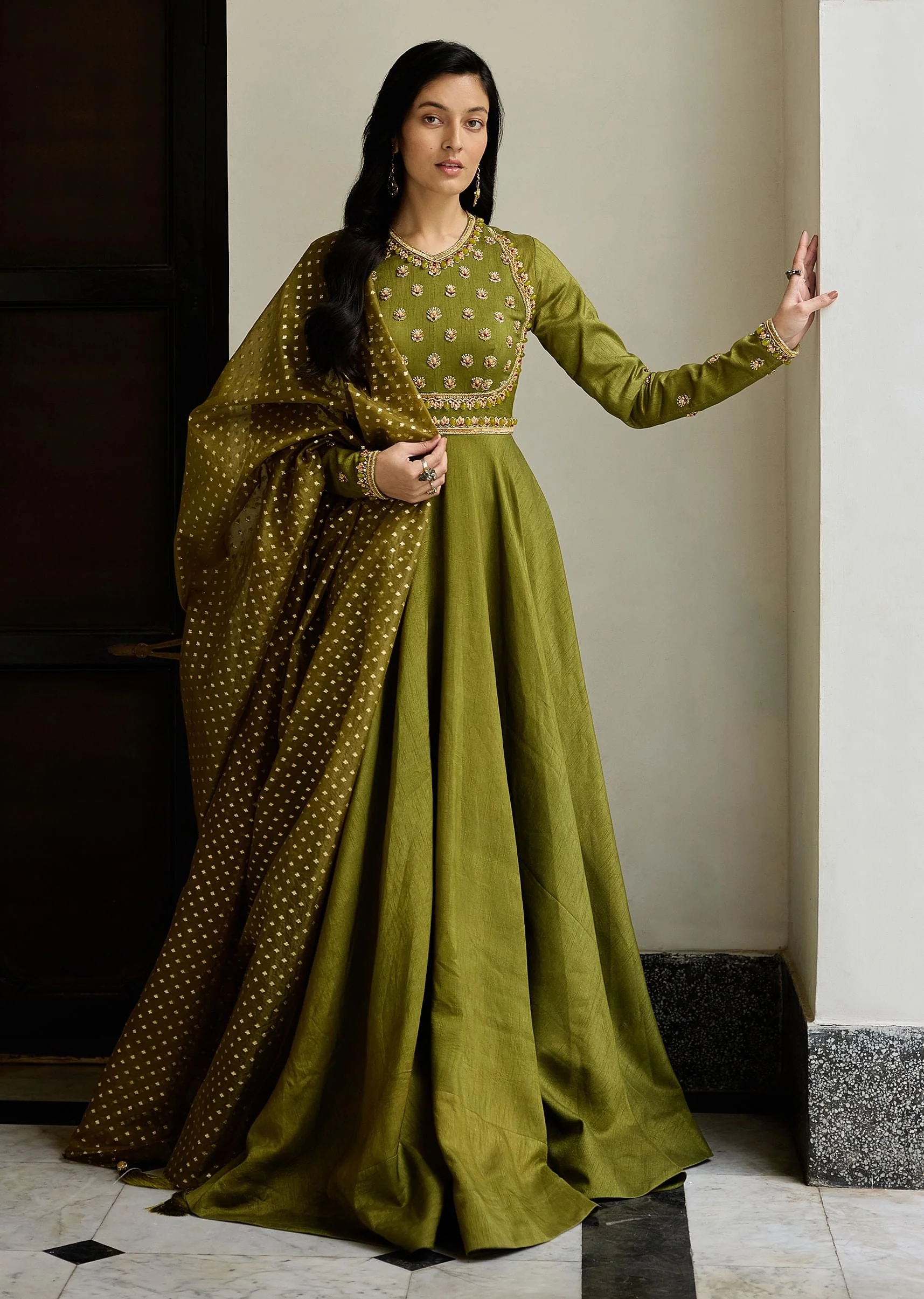 20882-mehendi-green-tussar-anarkali-suit-with-cutdana-embroidery-1.webp Mehendi Green Tussar Anarkali Suit With Cutdana Embroidery