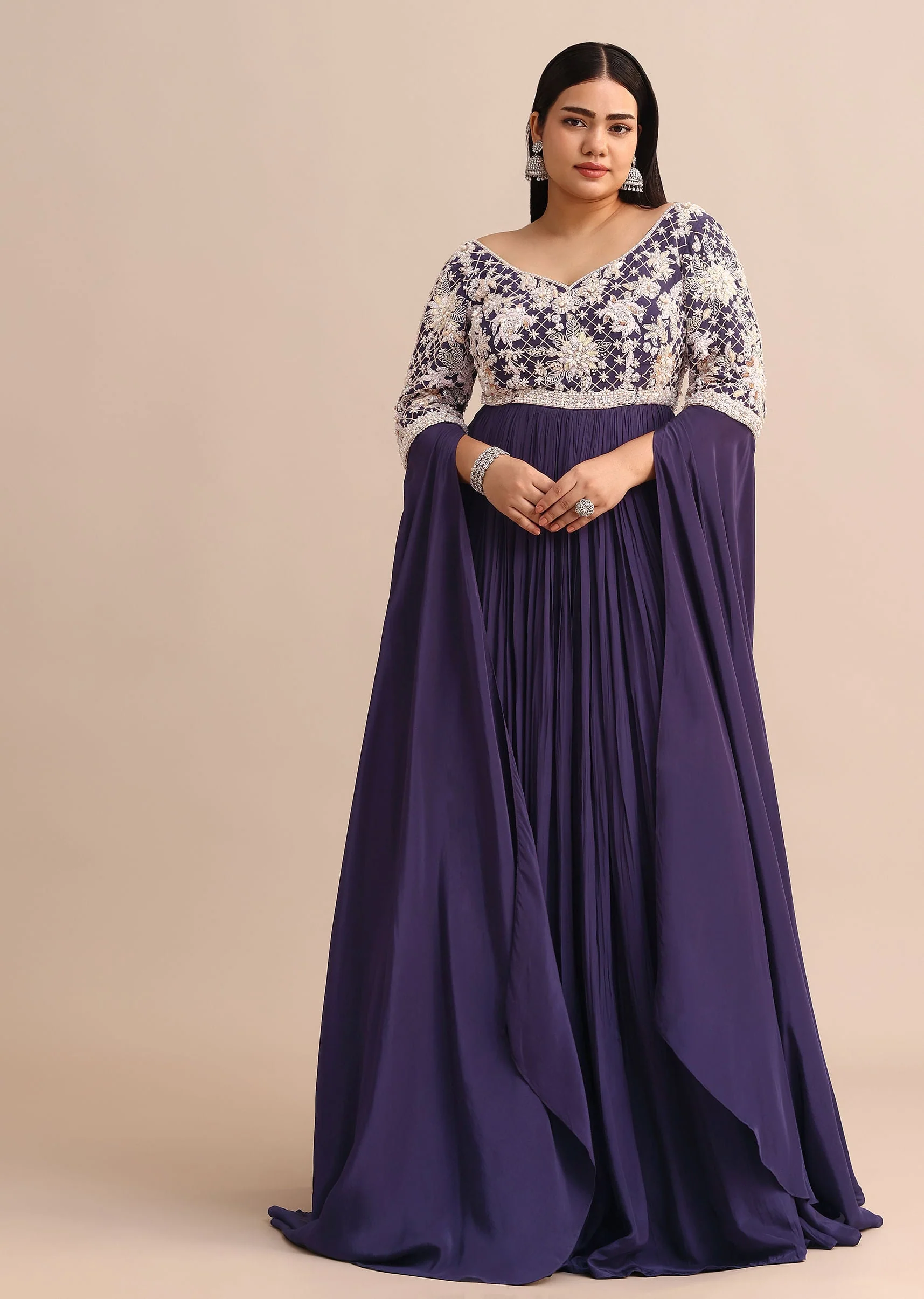 21116-purple-gown-with-cape-style-sleeves-in-jaal-work-1.webp Purple Gown With Cape Style Sleeves in Jaal Work