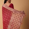 Red Banarasi Georgette Saree With Bandhani Weave And Unstitched Blouse Piece