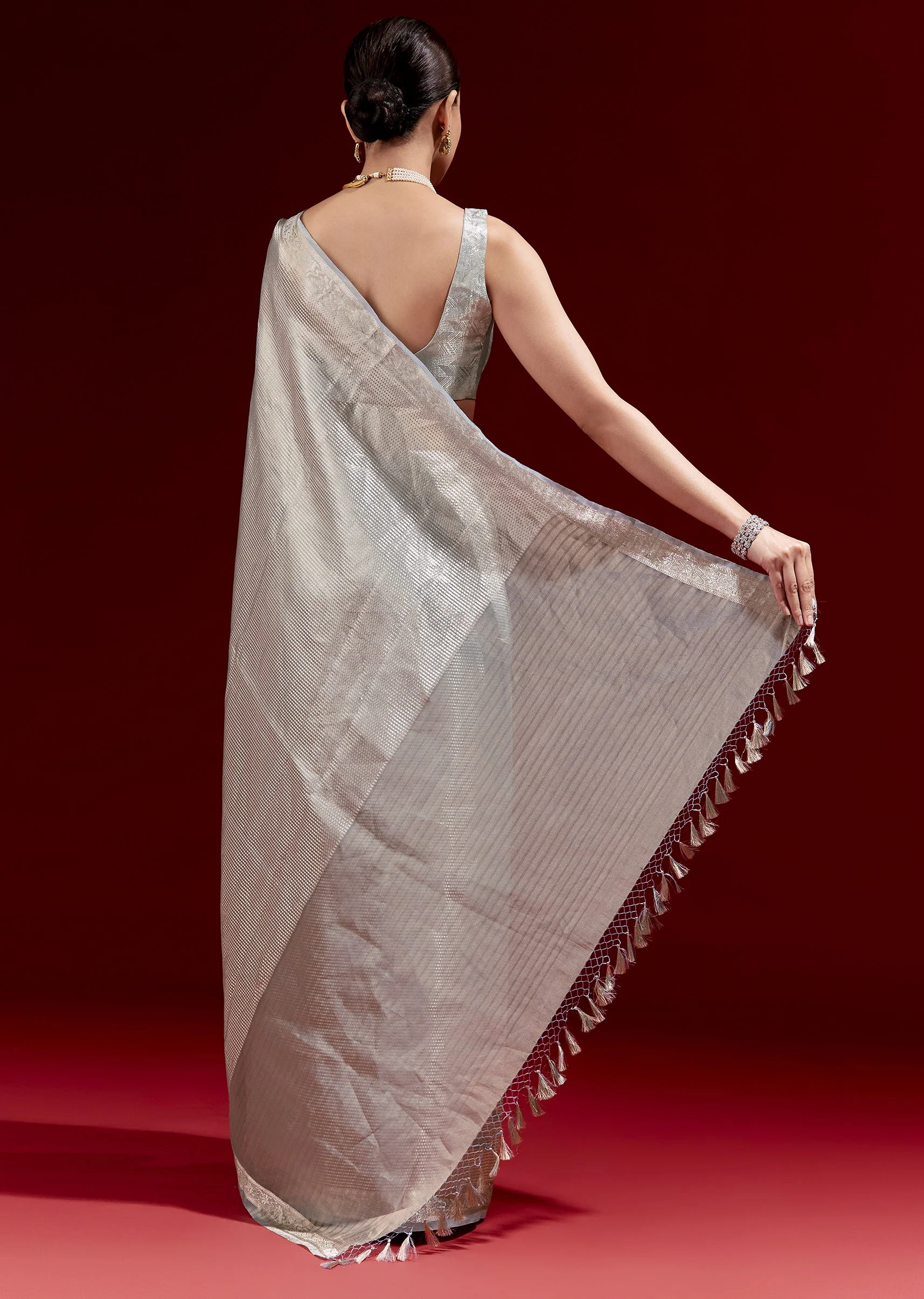 Metallic Blue Banarasi Tissue Saree With Micro Geometric Weave And Floral Woven Border