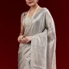 Metallic Blue Banarasi Tissue Saree With Micro Geometric Weave And Floral Woven Border